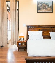 Cozy BNB room at EVA Spaces with bed and decor